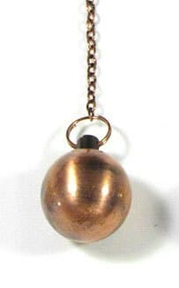 N° 1558 – PENDULE BOULE Témoin – 1 couleur : Cuivre vieilli