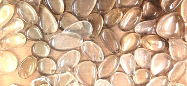 ..GALET PERCE OEIL DE TIGRE