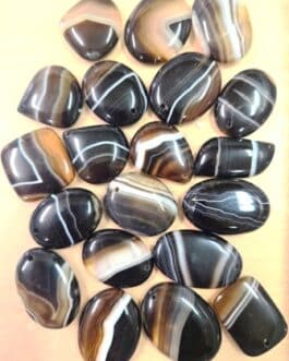 ..GALET PERCE ONYX NOIR (JASPE BOTSWANA) ..GALET PERCE ONYX NOIR (JASPE BOTSWANA)